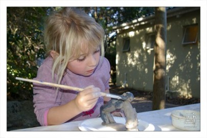 Completely absorbed with painting the badger